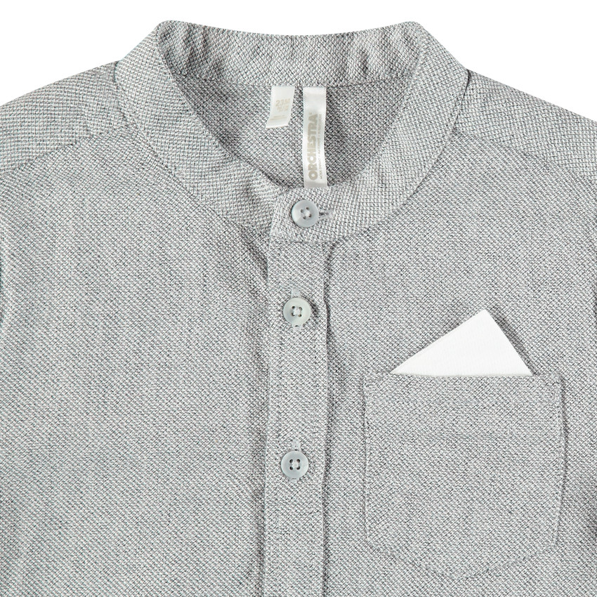 Chemise manches longues en maille chinée col mao et poche 