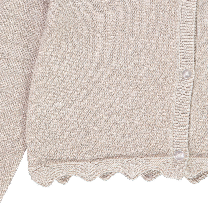 Gilet corto de punto con base festoneada para niña 