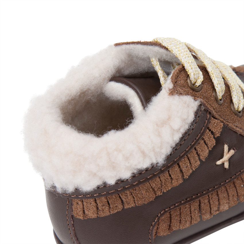 Botines de cuero forrados con flecos brillantes  