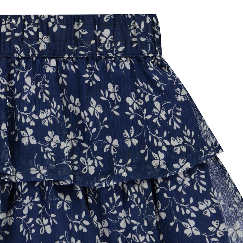 Falda corta de flores en tul con volantes para niña 