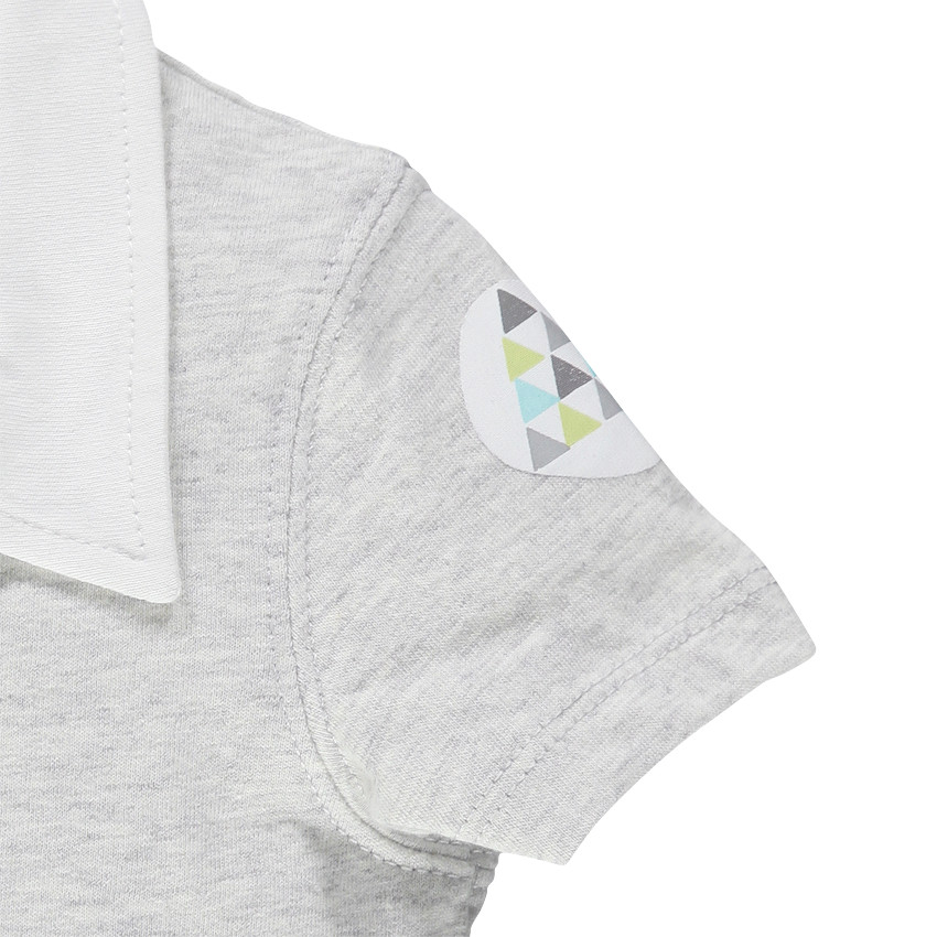 Polo manga corta cierre con botones a presión en la parte delantera 