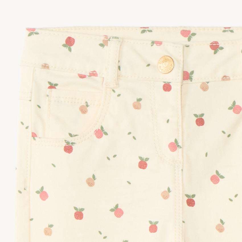 Pantalón slim para niña con estampado de manzana 