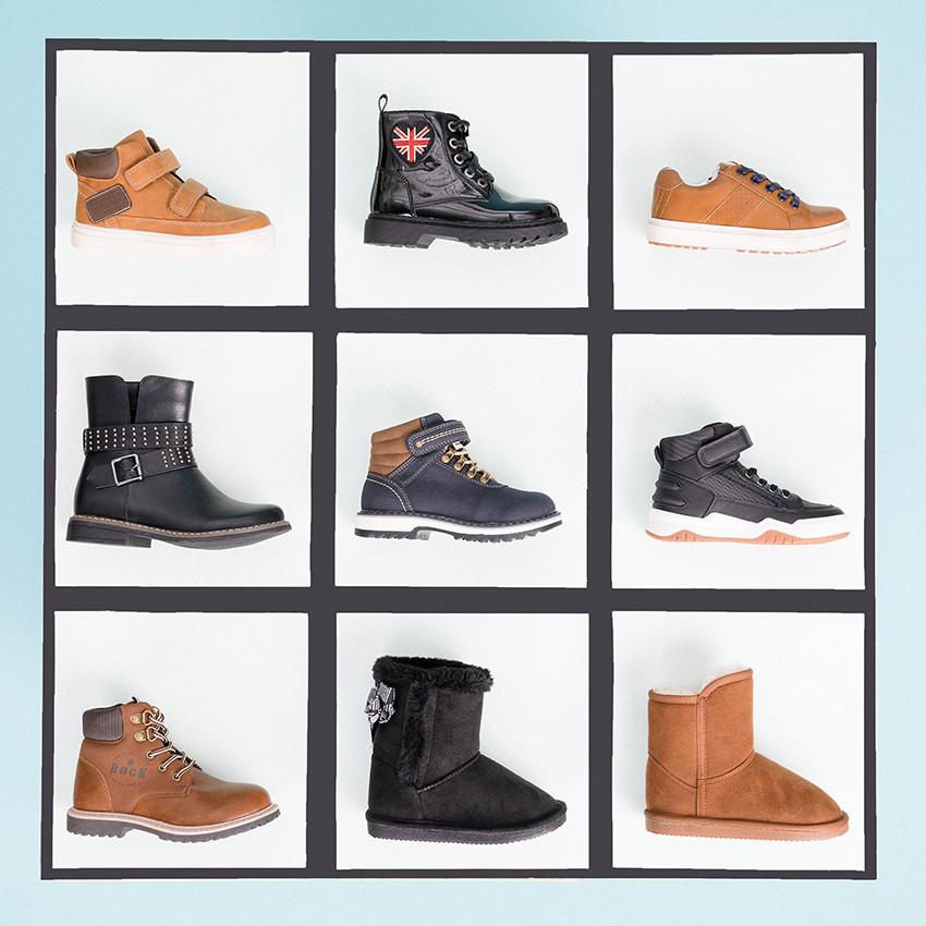 Botines efecto cuero color cognac con cordones y cremallera. 