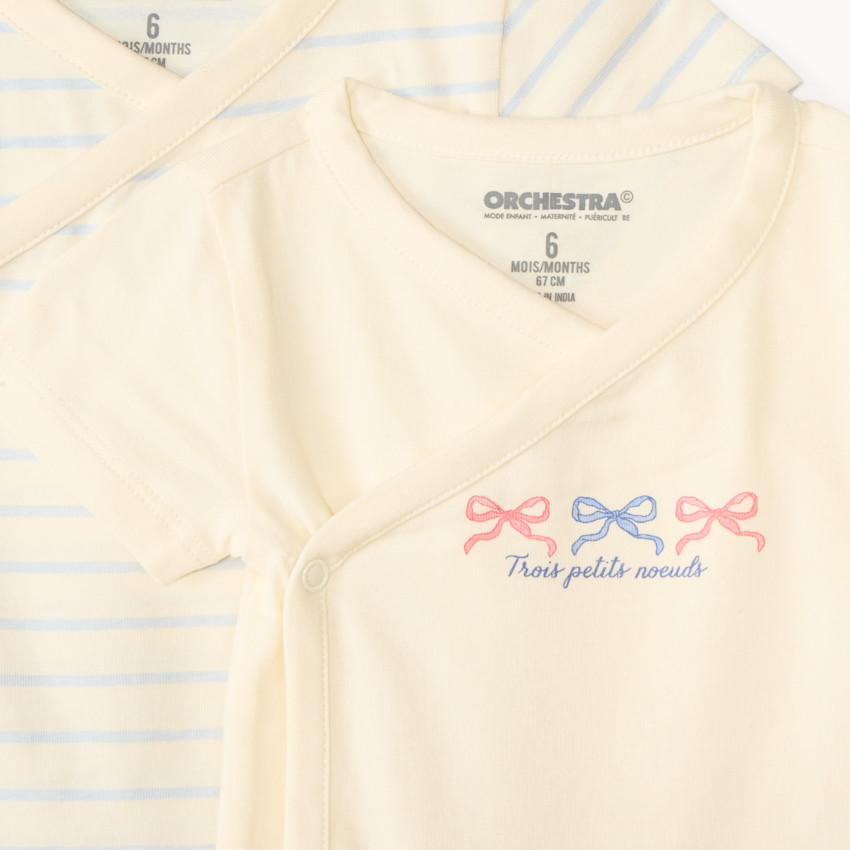 Conjunto de 7 bodies de manga corta con diseño de lazo para niña, apertura diferente según la edad. 