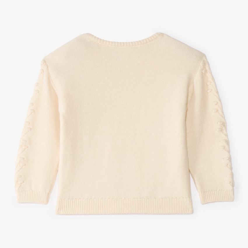 Jersey de bebé niña con relieve de fantasía. 