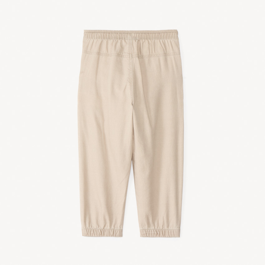 Pantalón de tela con puños para bebé niño. 