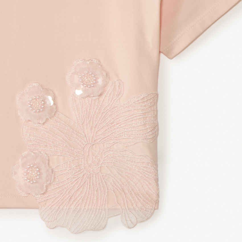 Camiseta de manga corta con grandes flores de lentejuelas para niña. 