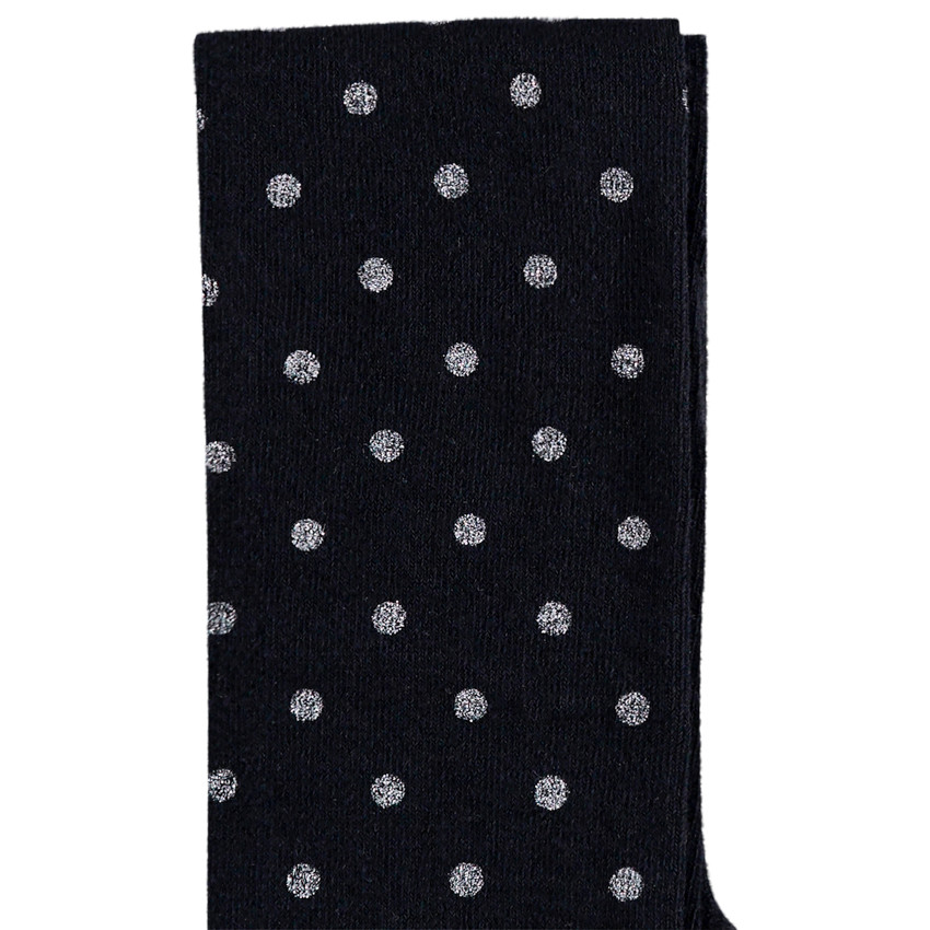 Medias gruesas con estampado de lunares plateados. 