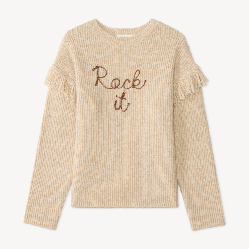 Jersey de chica con flecos y letras en cordón. 