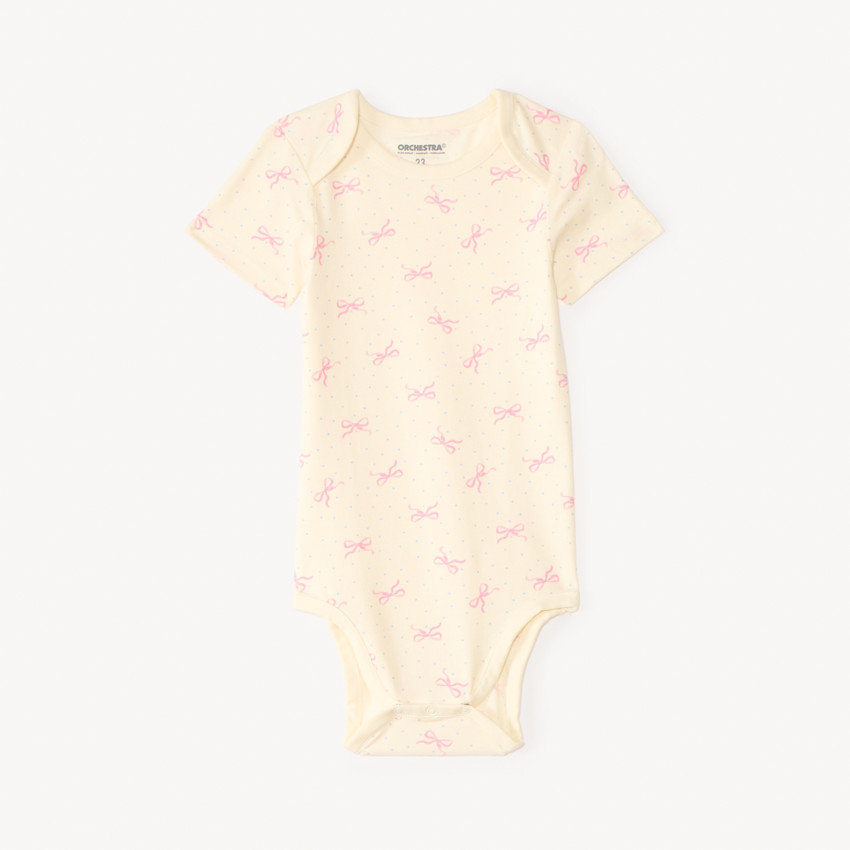 Conjunto de 7 bodies de manga corta con diseño de lazo para niña, apertura diferente según la edad. 