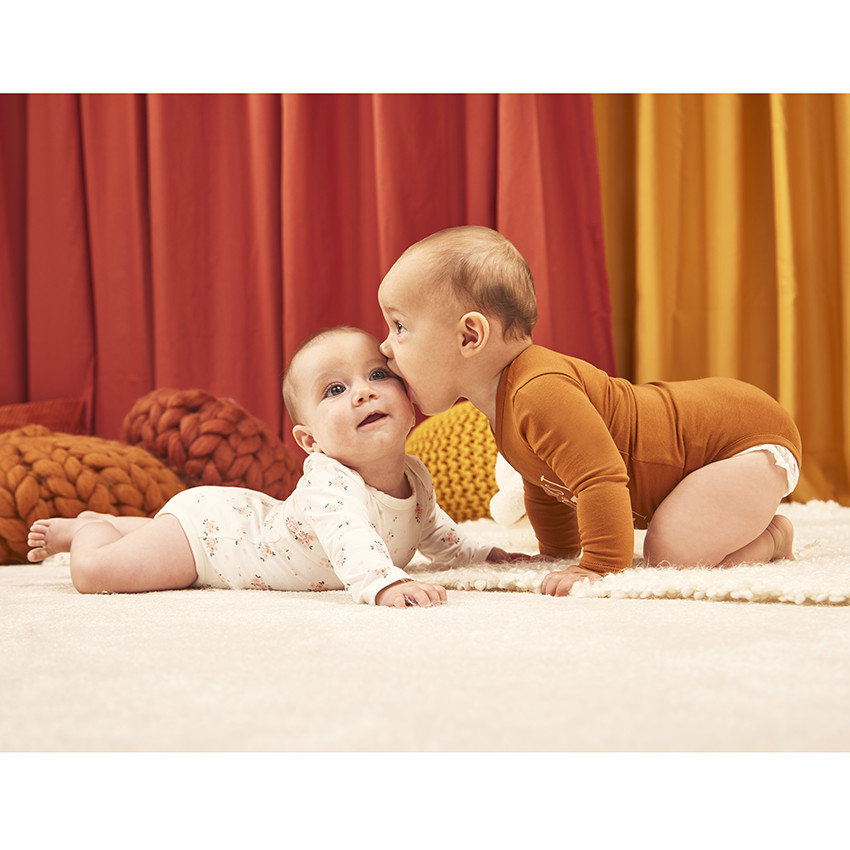 Pack de 7 bodies de manga larga para bebé niña. 