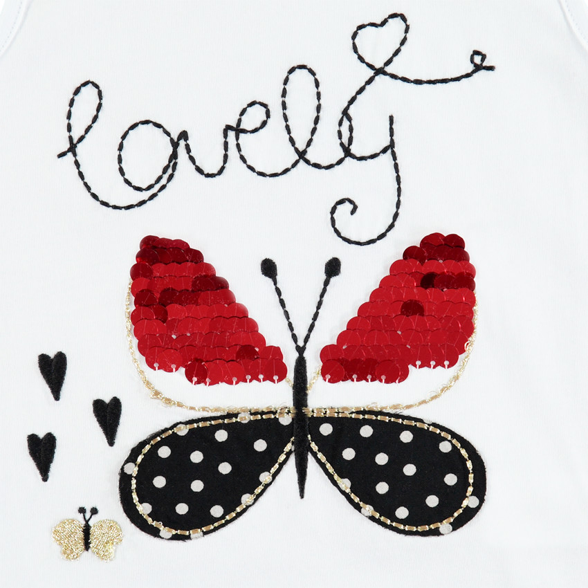 Ensemble avec débardeur à papillon en sequins et short à pois 