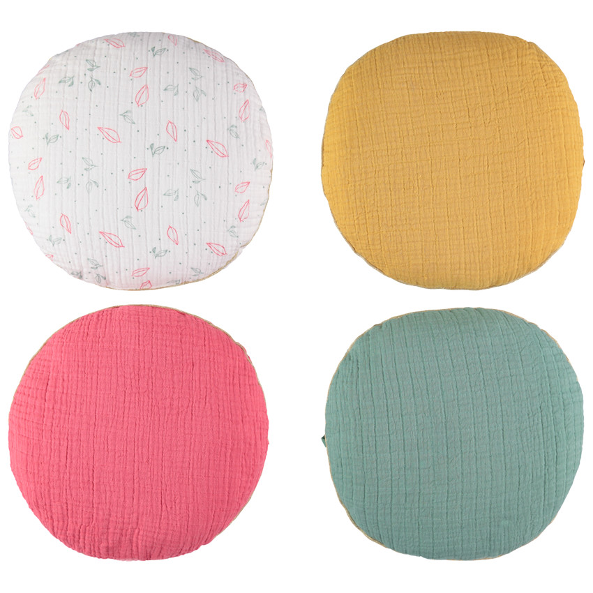 Cojín decorativo redondo en gasa de algodón modulable en protector de cuna o parque 