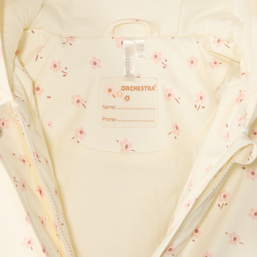Parka de goma con capucha y estampado de flores para niña. 