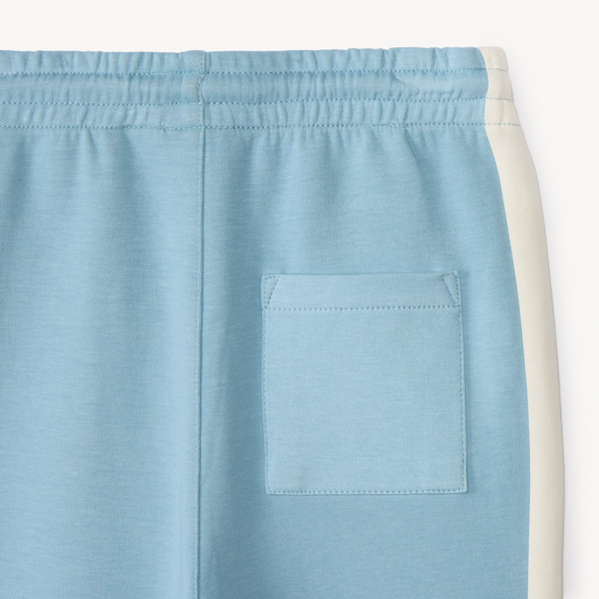 Conjunto de chándal de neopreno con estampado de oso para niño. 