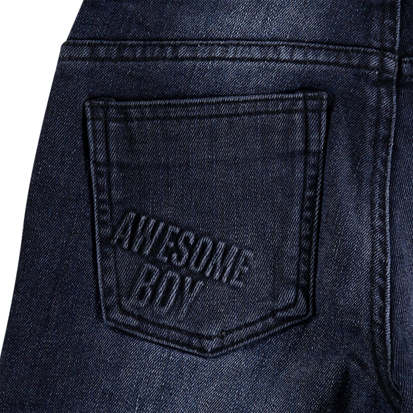 Vaqueros de efecto desgastado y arrugado con 6 bolsillos 