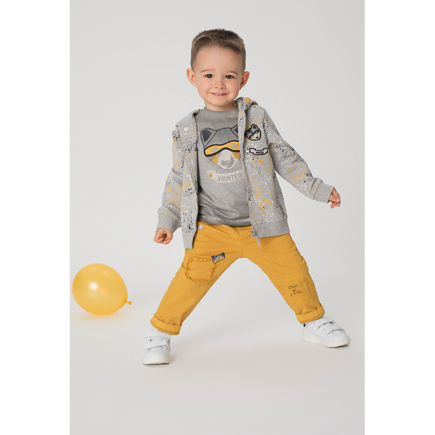 Pantalón de tela de fantasía con parches y bordados  