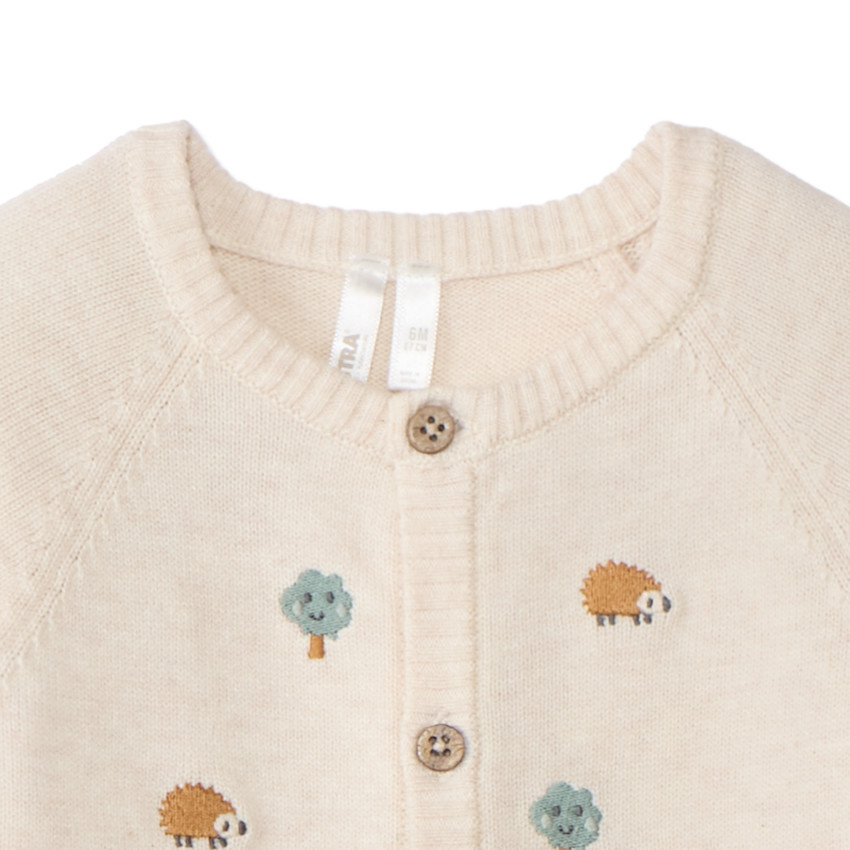 Combinaison en tricot avec broderies pour bébé garçon 