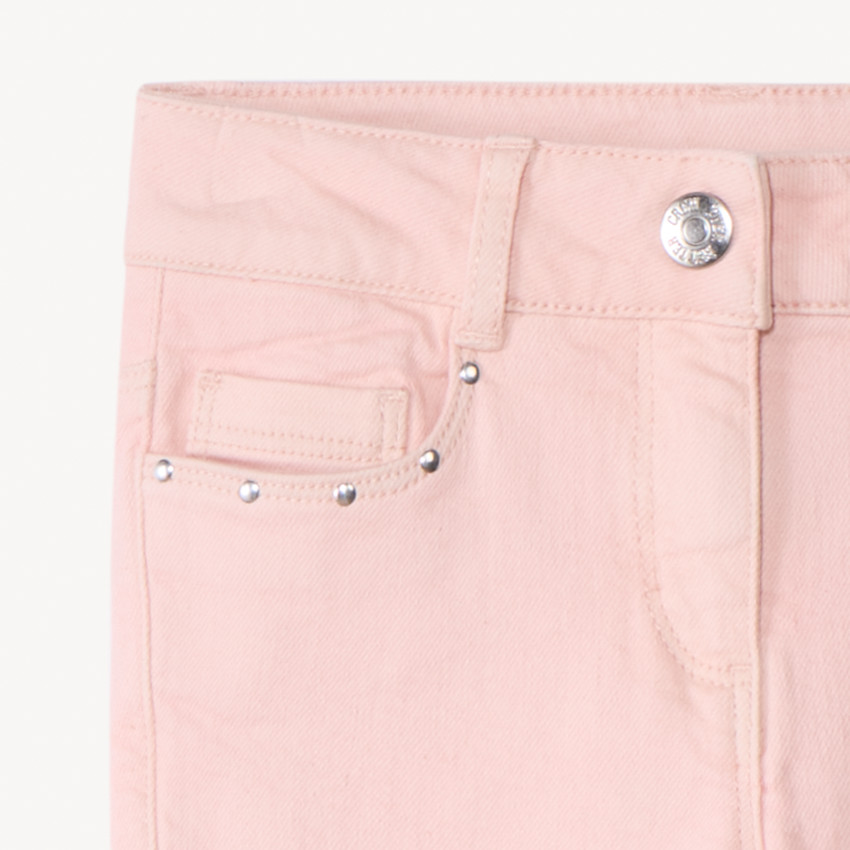 Vaqueros slim lisos con remaches para niña 