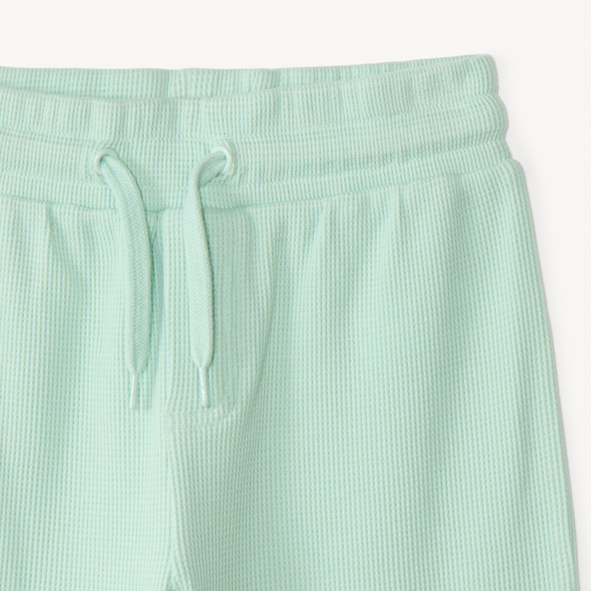 Conjunto corto de tejido de panal de 2 piezas camiseta + bermudas para niño 