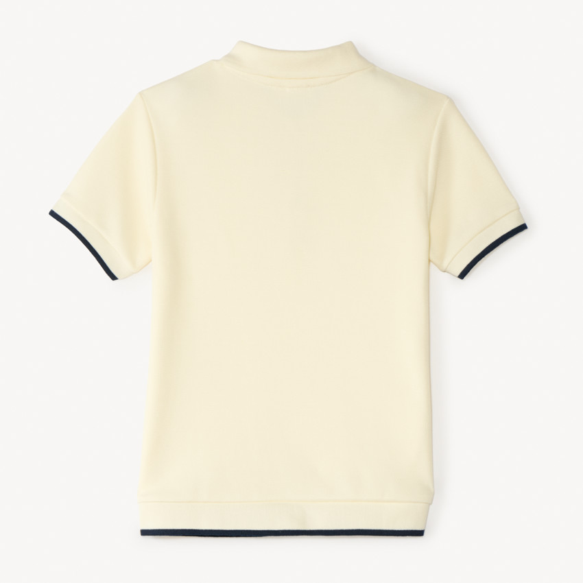 Polo de manga corta bicolor para niño. 