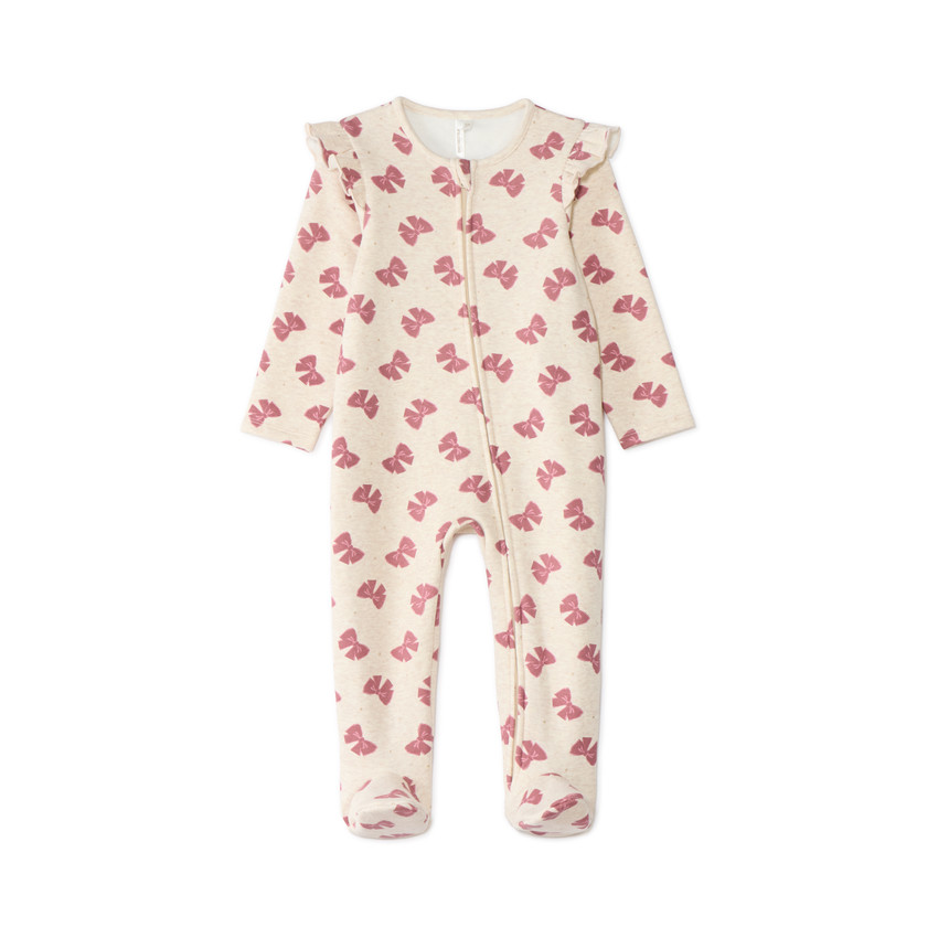 Pijamas de bebé niña con cremallera forrados en sherpa con motivo de lazos. 