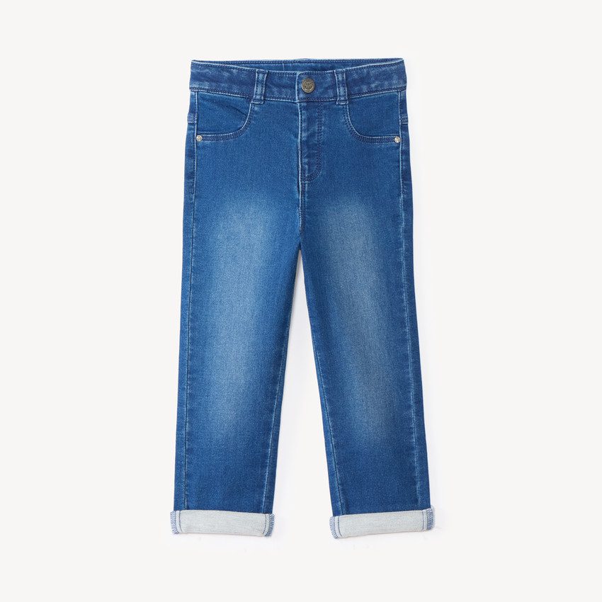 Pantalón vaquero para bebé niño liso con dobladillos. 