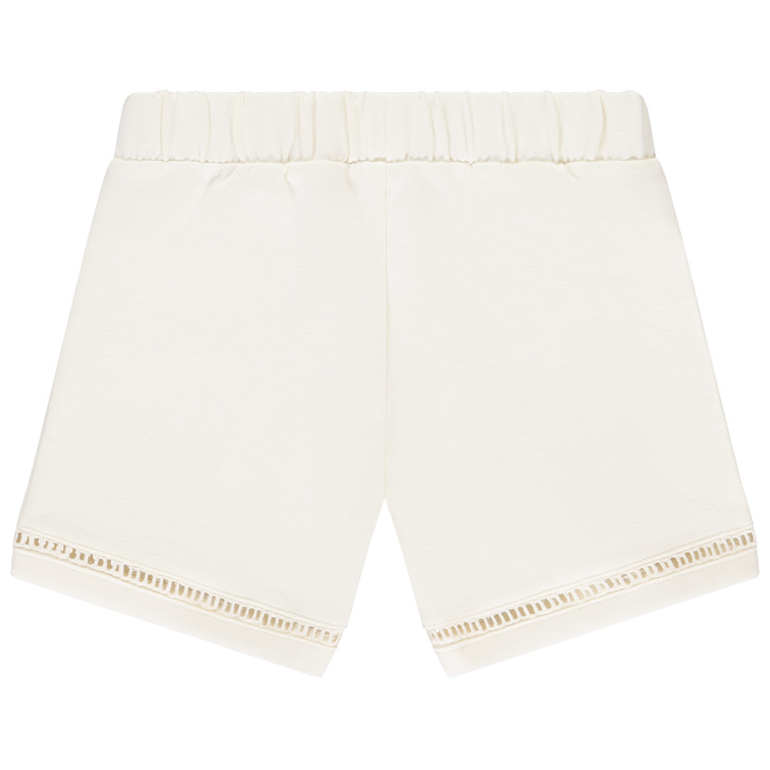 Short liso de felpa con detalles calados niña 