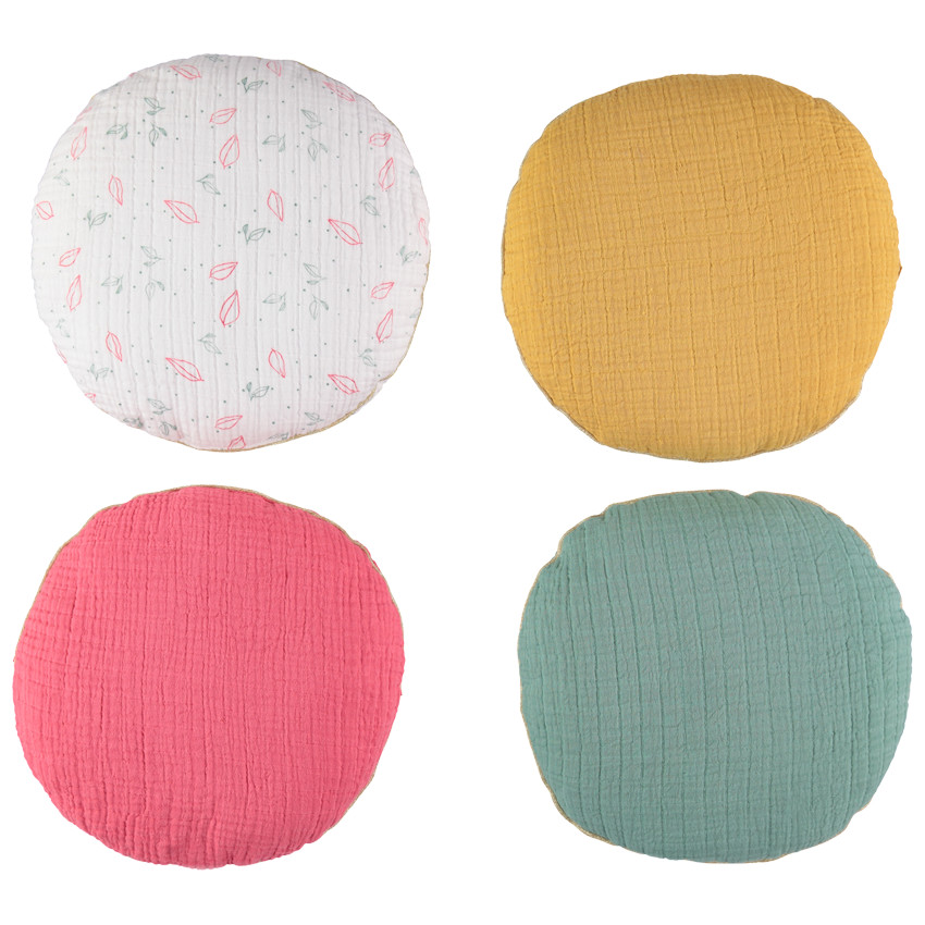 Cojín decorativo redondo en gasa de algodón modulable en protector de cuna o parque 