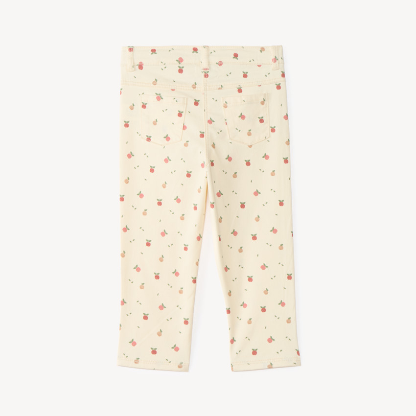 Pantalón slim para niña con estampado de manzana 