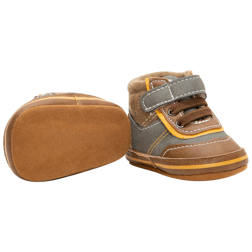 Patucos flexibles de dos materiales con cordones y velcro 