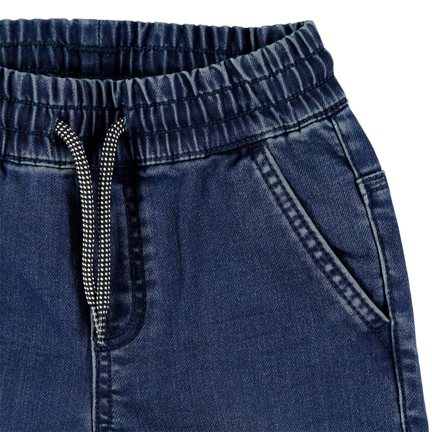 Vaqueros con efecto desgastado y arrugado en la cintura elástica y cordones de cierre 