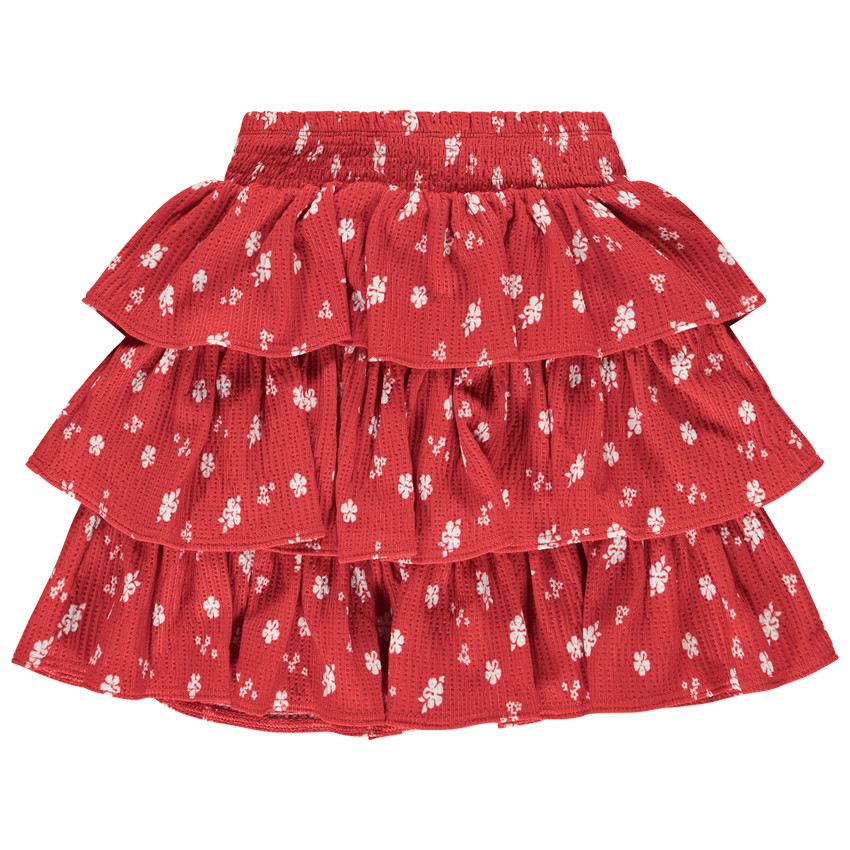 Falda corta de punto calado y estampado con volantes para niña 