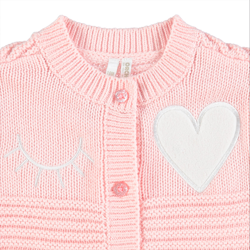 Chaqueta de punto otomano con guiño bordado y corazón 