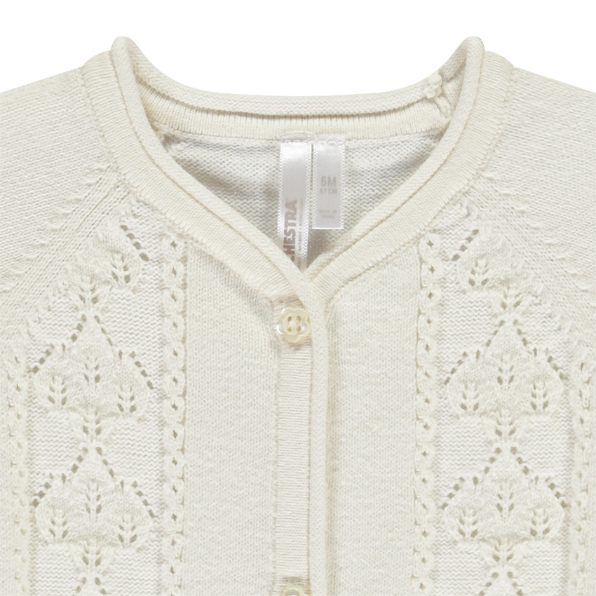 Gilet de punto calado para niña. 