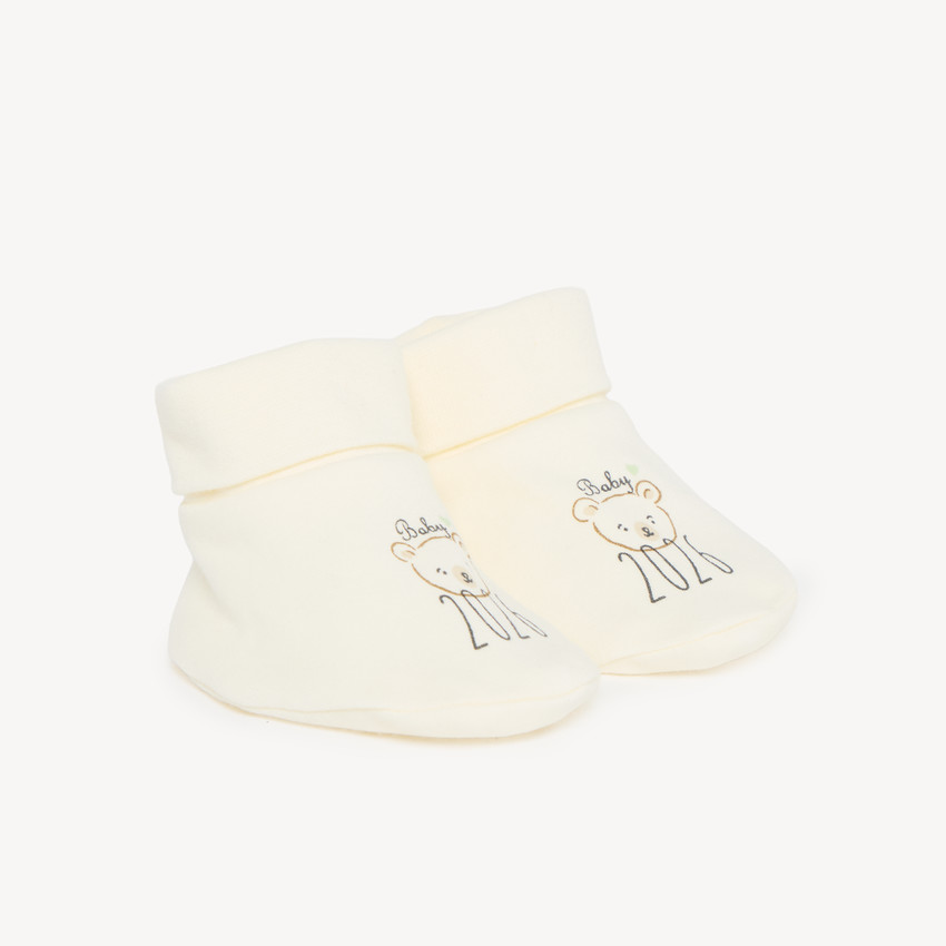 Zapatitos de nacimiento en interlock "Baby 2026 