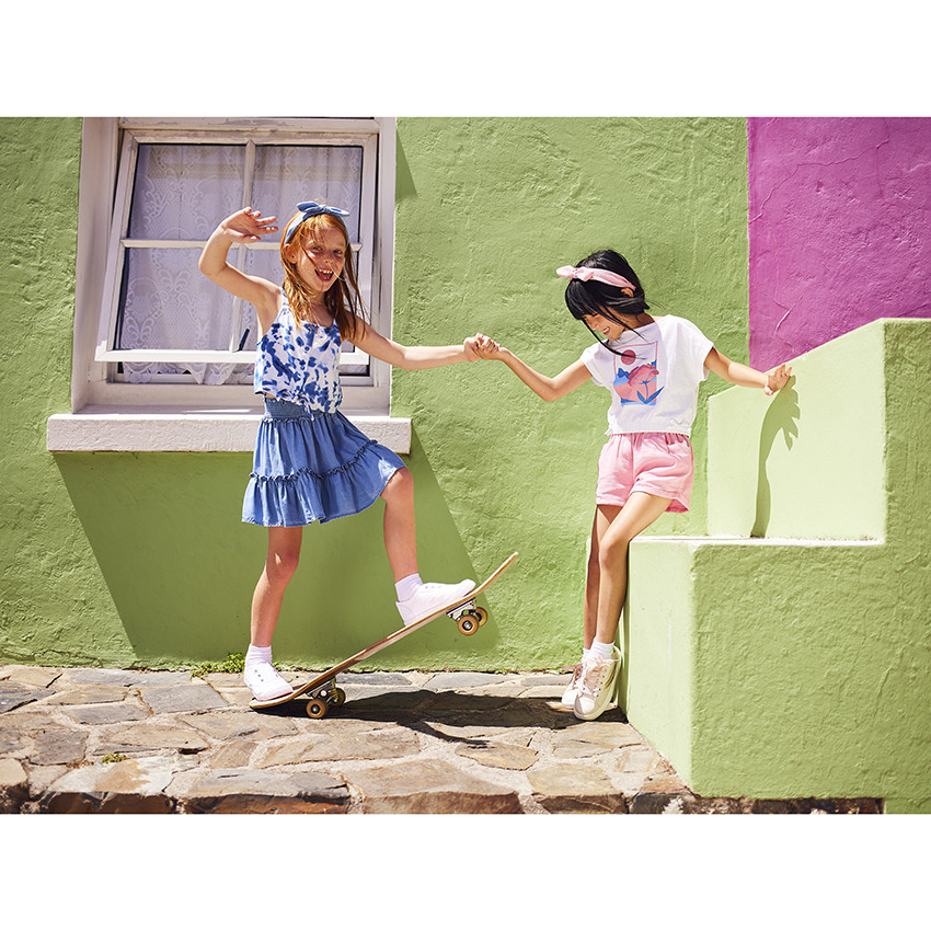 Short de tiro alto liso en algodón fantasía para niña 