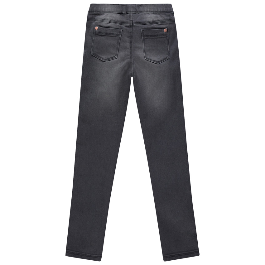 Jeans slim efecto lavado para niña. 