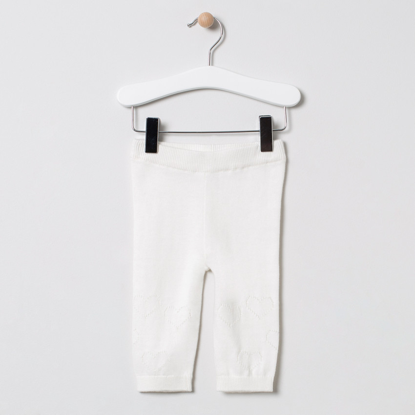 Conjunto con vestido de punto y pantalón con corazones  