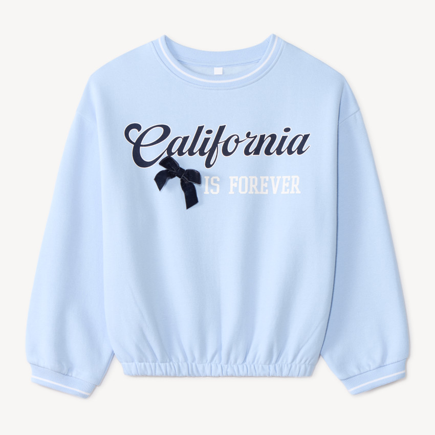 Sudadera niña con estampado de California y base elástica. 