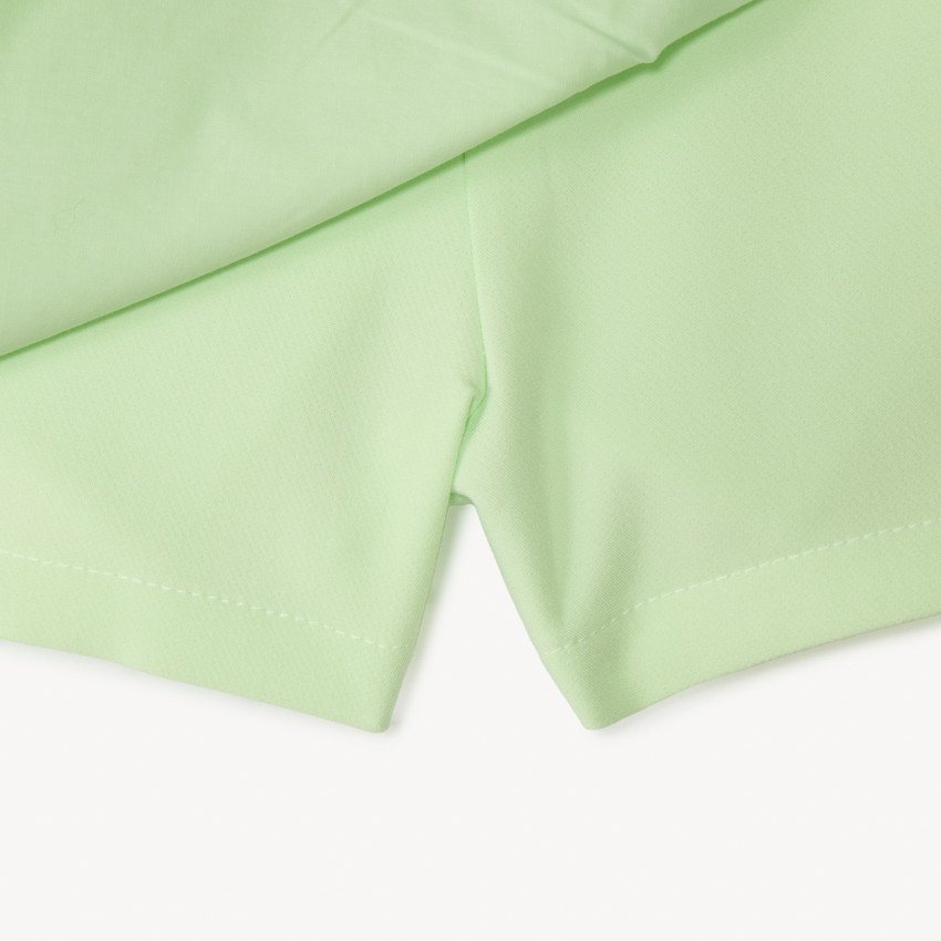 Falda corta efecto anudado lisa para niña 