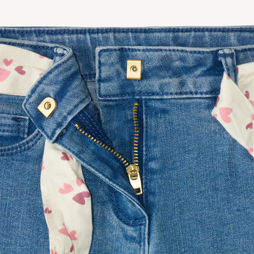 Jean slim para niña con cinturón de tela 