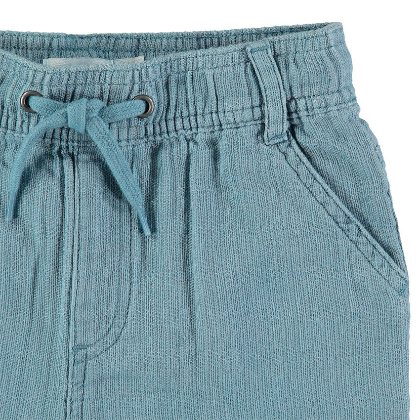 Pantalon corto en maille fantasia y bolsillos italianos 