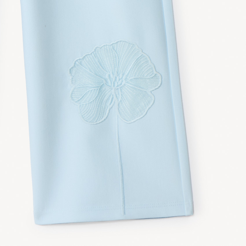 Pantalón amplio con pinzas y flor bordada para niña 