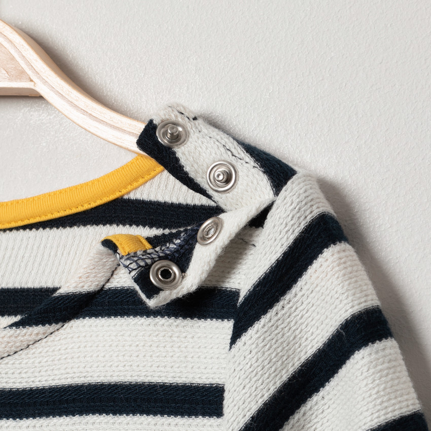 Vestido manga larga rayas y flor tul 