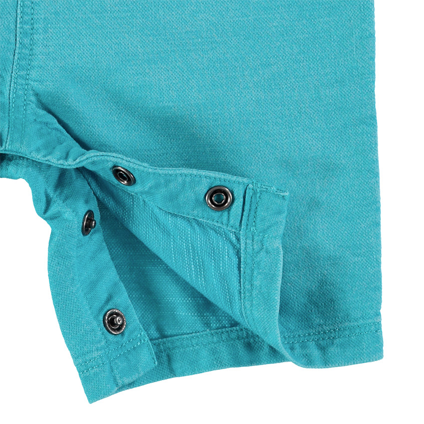 Peto corto azul en maille y gafas bordadas  Additional Peto corto azul en maille y gafas bordadas