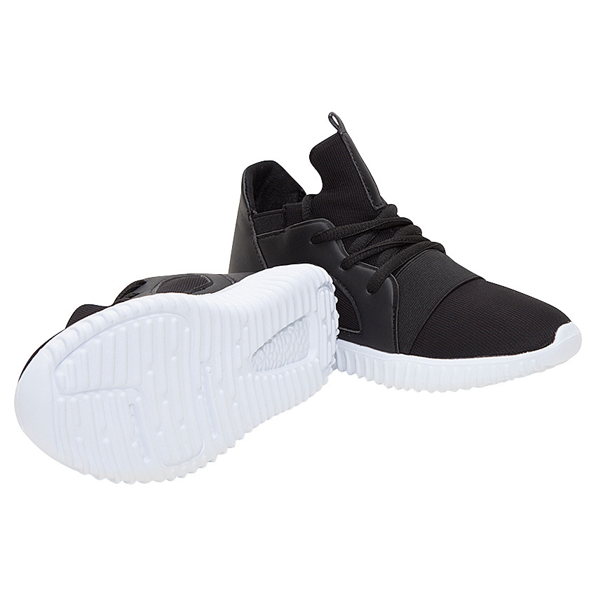 Deportivas bajas en dos materiales con cordones y elásticos 