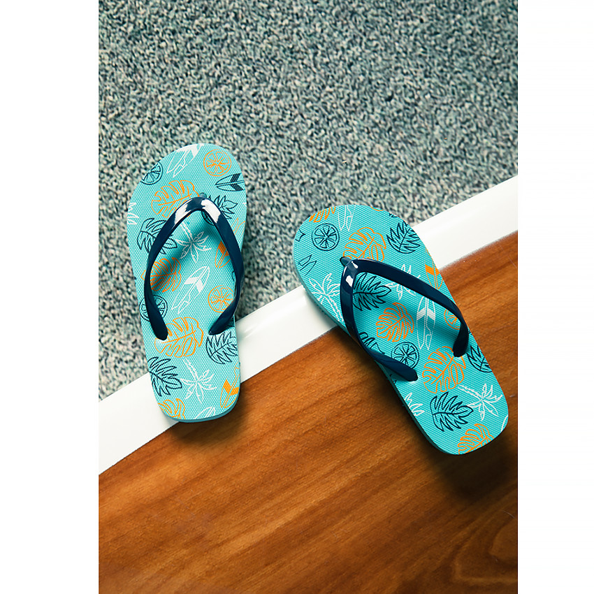 Tongs impresos con diseño de hojas para niño con tira según la edad. 