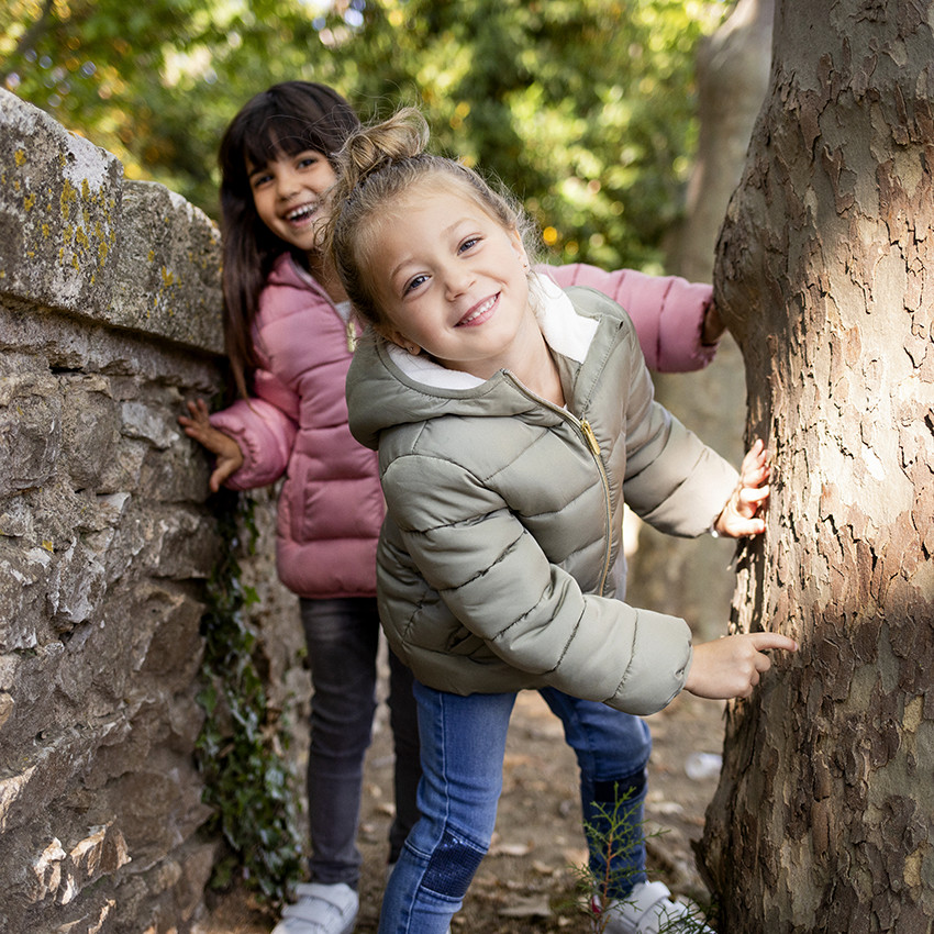 Plumífero con capucha y forro micropolar 