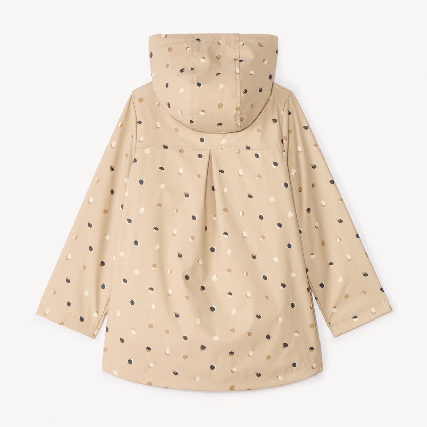 Parka de goma con estampado de lunares y forro para niña. 
